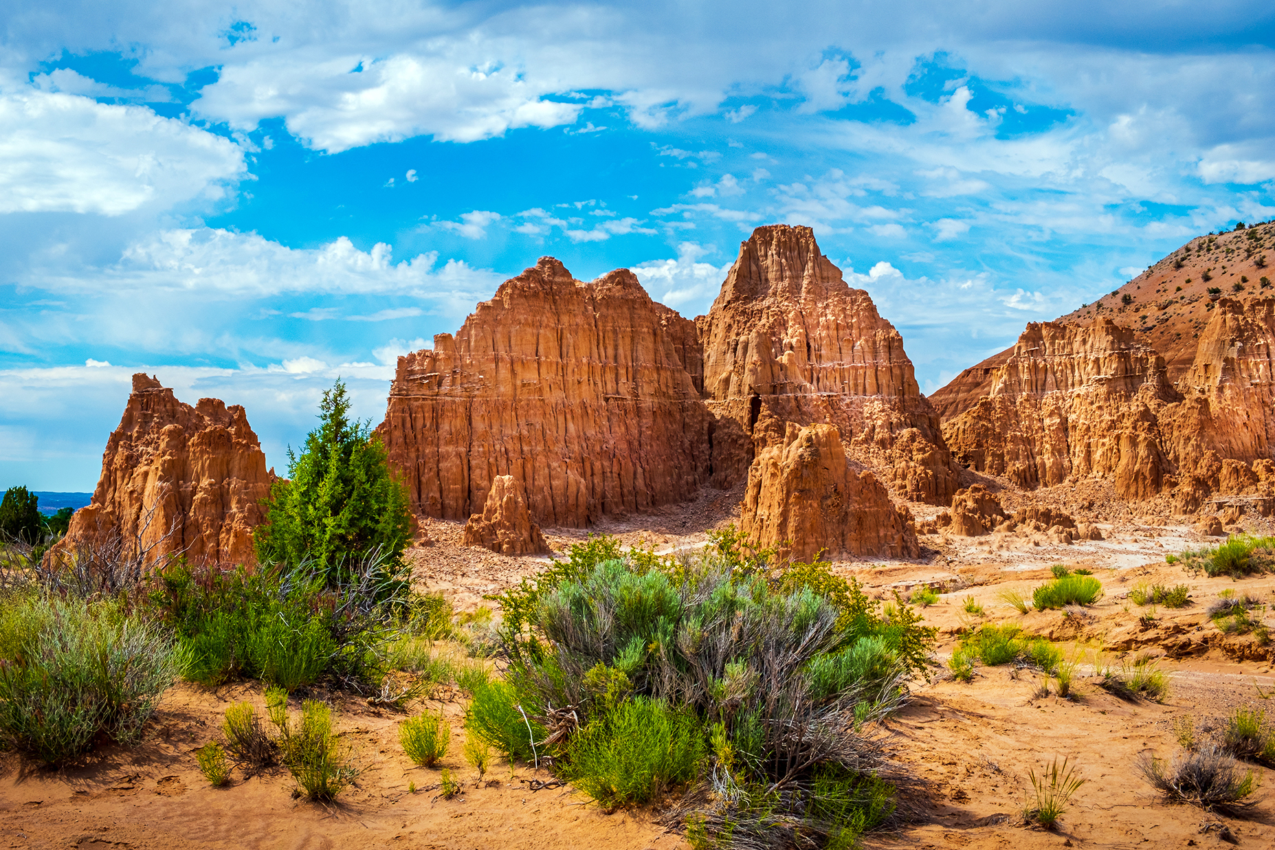 Cathedral Gorge State Park in Nevada with colorful sandstone formations and desert vegetation along Juniper Draw Trail
